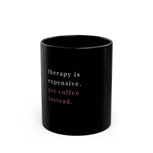 Black coffee mug with white text therapy is expensive get a coffee instead